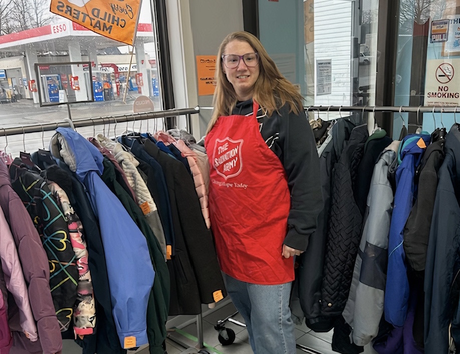 Salvation Army worker gets ready to distribute winter wear